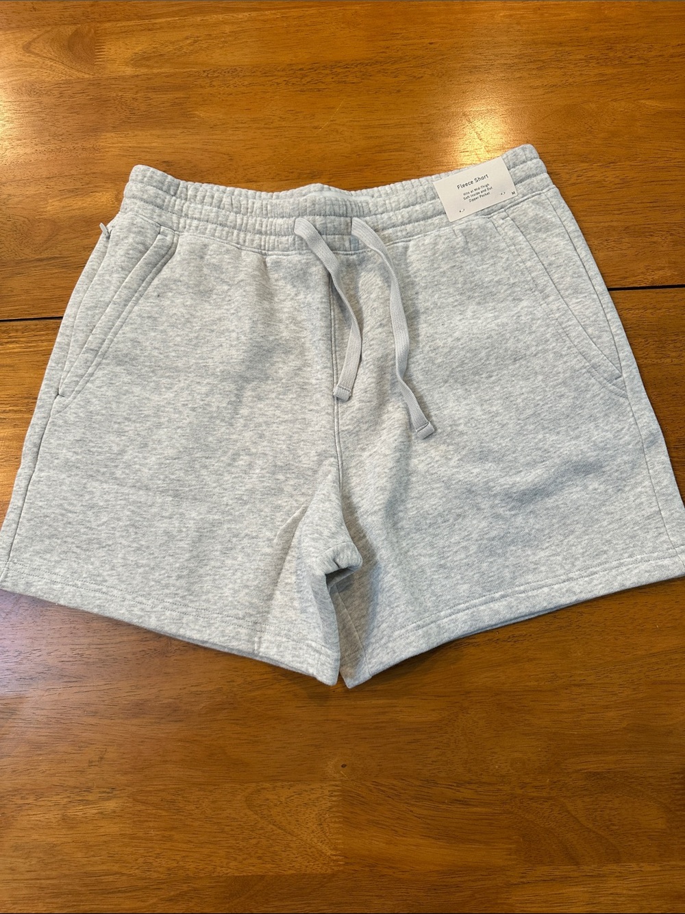 Hollister men’s light gray fleece shorts NWT size medium. Elastic & tie waist